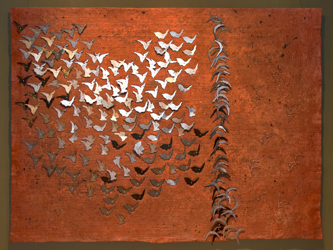 WE ARE STILL IN FLIGHT\nBlack iron, transparent acrylic, natural pigments and acrylic paint on felt. Mixed media on felt. 2x2.70 mt. 2017