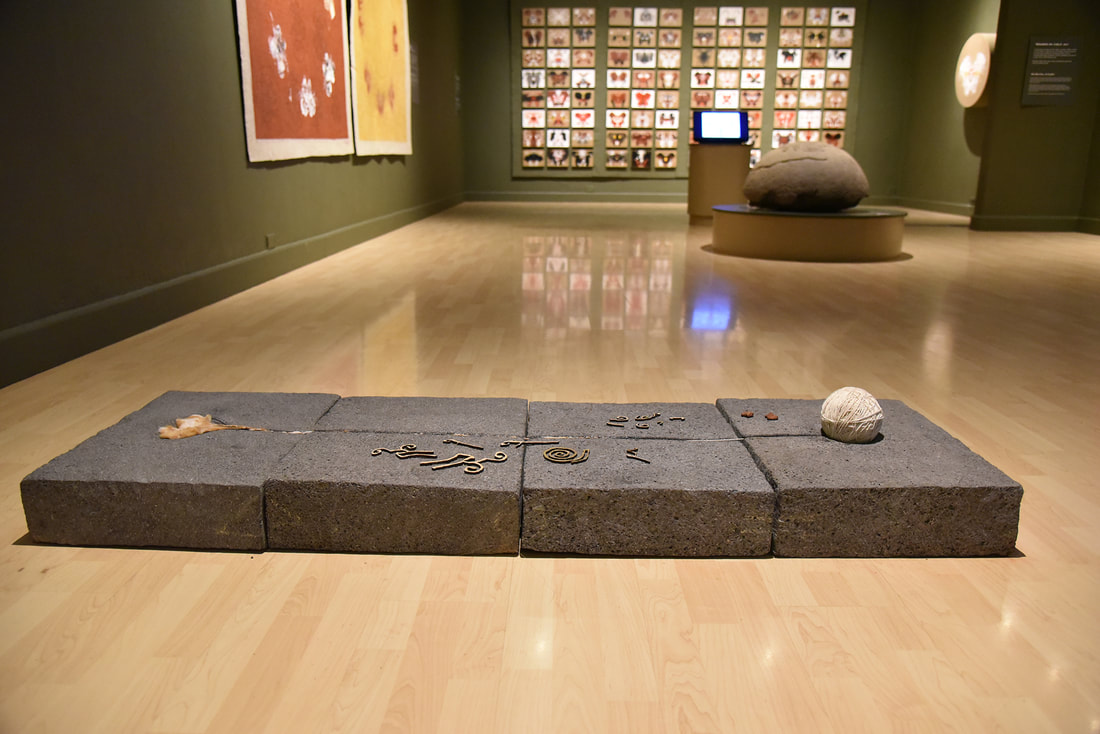 Death: THE ROAD OF COTTON\nMaterials: cement and stone tiles, and cotton planted, harvested and spun by Boruca women. 0.40x0.60x1.60 mt. 2017